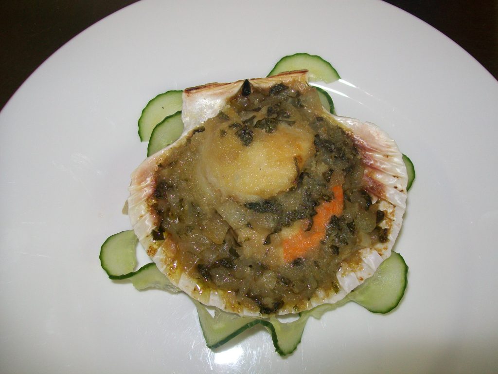 Scallops nestled on vermicelli with oregano butter sauce Chapel House